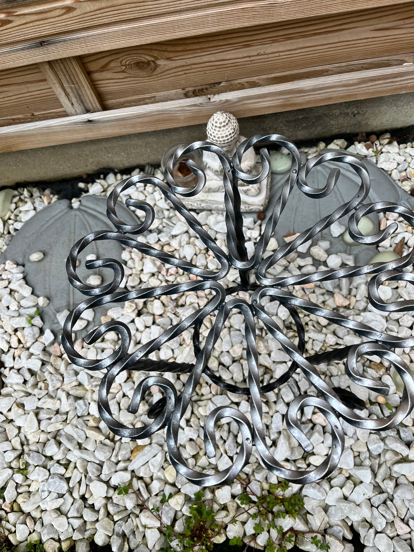 Porte plante en fer forgé