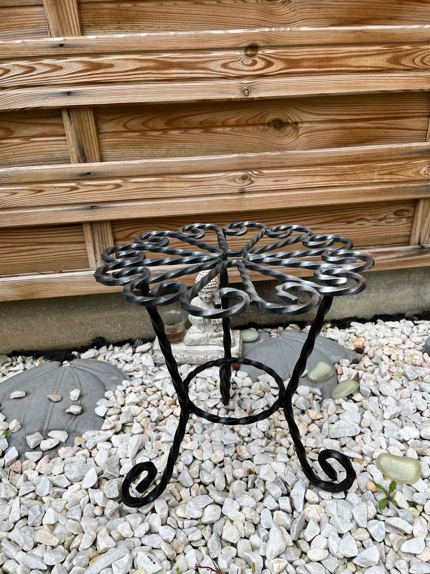 Porte plante en fer forgé