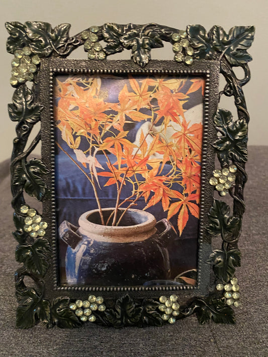 Cadre avec décor feuilles et raisins