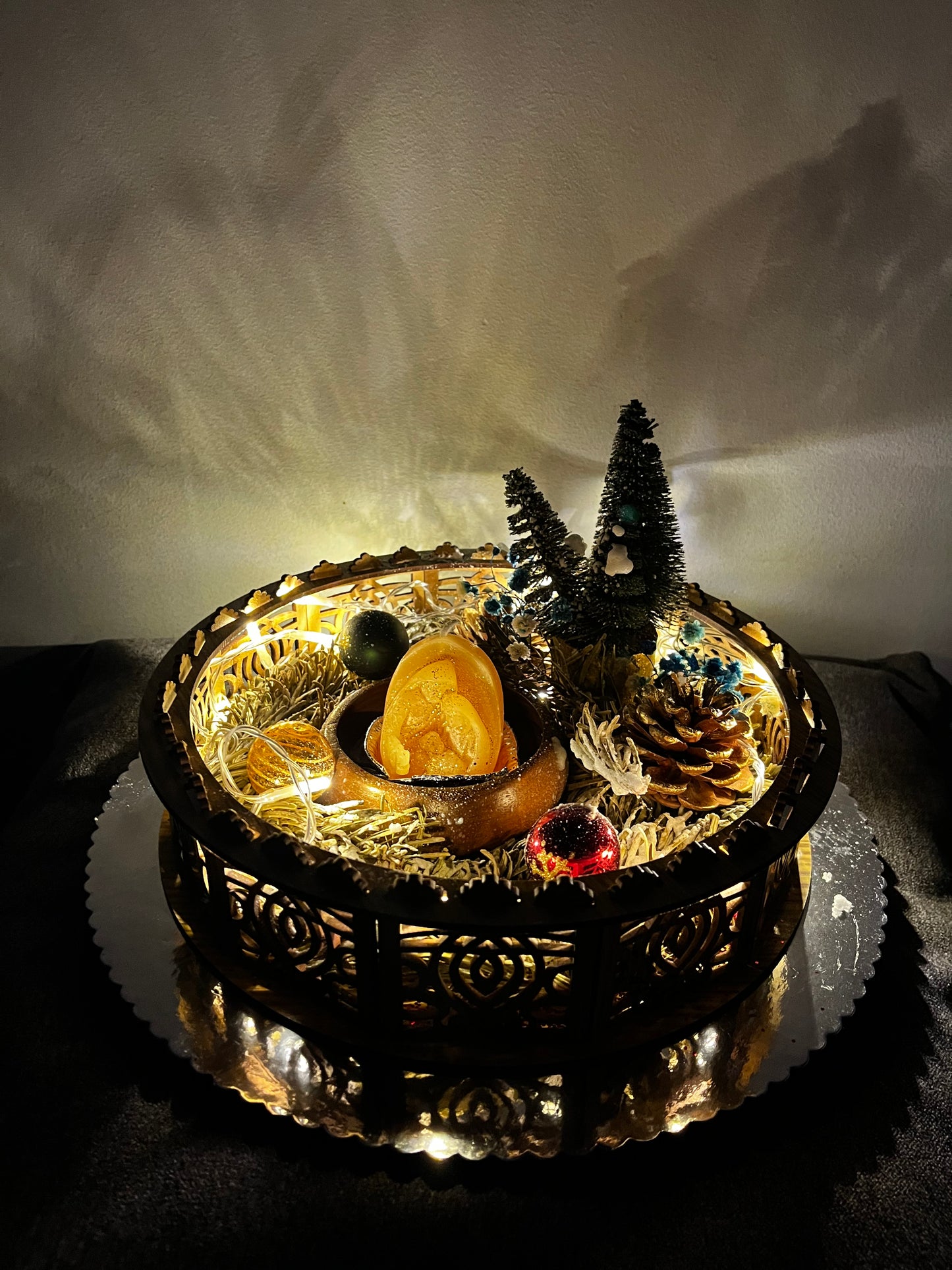 Centre de table avec bougie de Noël.