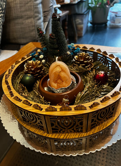 Centre de table avec bougie de Noël.