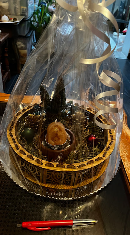 Centre de table avec bougie de Noël.