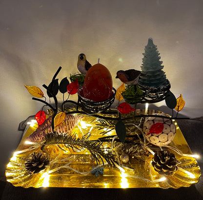 Centre de table avec deux bougies de Noël
