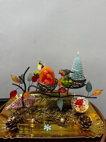 Centre de table avec deux bougies de Noël