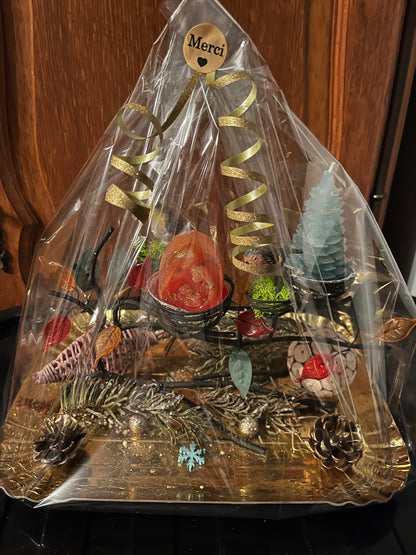 Centre de table avec deux bougies de Noël