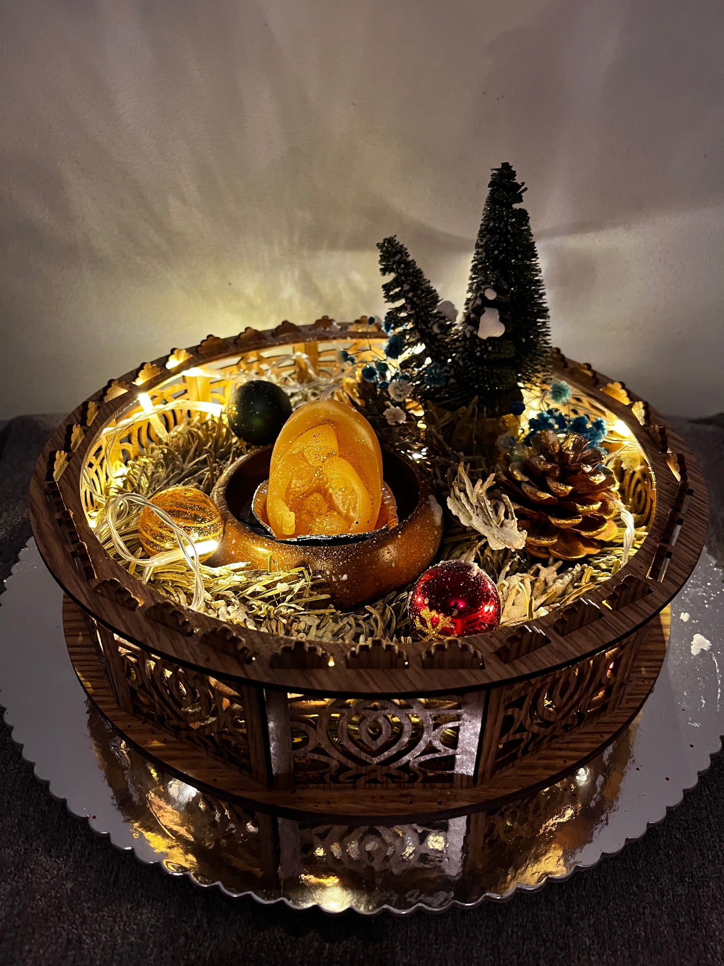 Centre de table avec bougie de Noël.