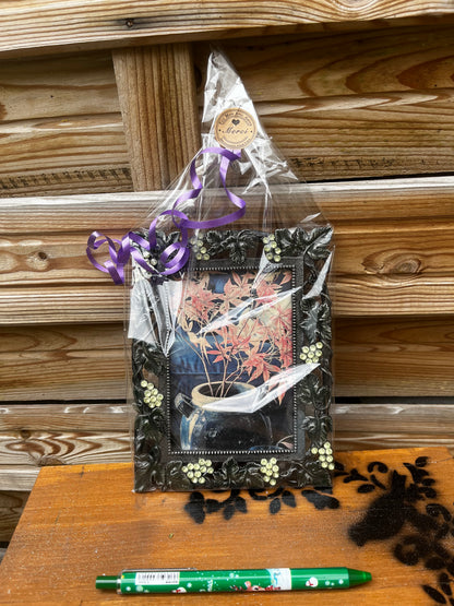 Cadre avec décor feuilles et raisins