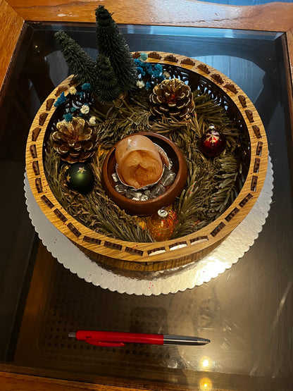 Centre de table avec bougie de Noël.