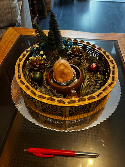 Centre de table avec bougie de Noël.