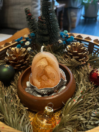 Centre de table avec bougie de Noël.